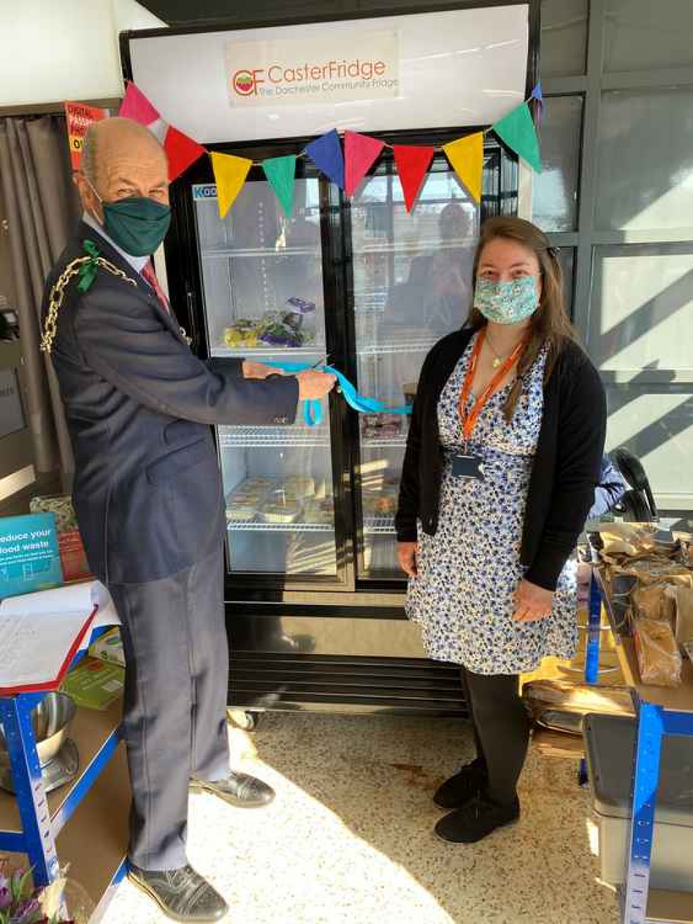 Dorchester mayor, councillor Richard Biggs, opening CasterFridge with project coordinator from Volunteer Centre Dorset, Issy McGowan