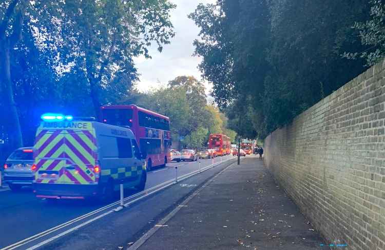 An ambulance rushes to the scene