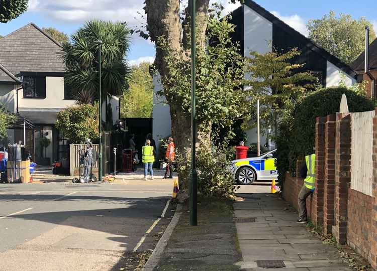 The filming is happening at a large house