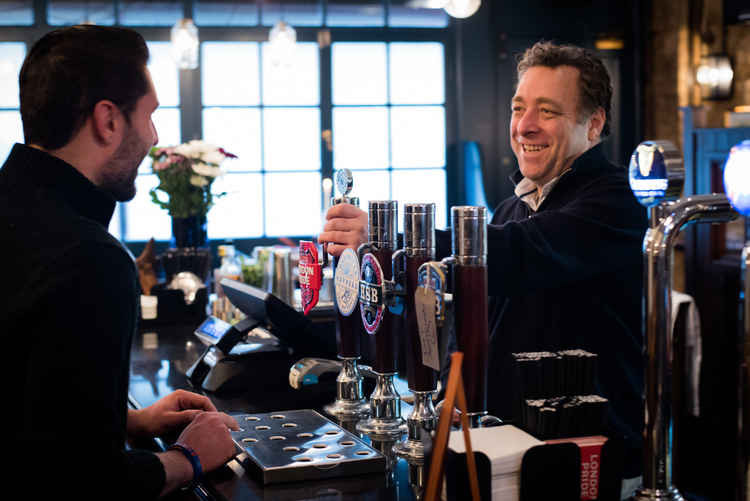 Nick Botting at the Angel and Crown Pub before lockdown. Photo: Fuller, Smith & Turner