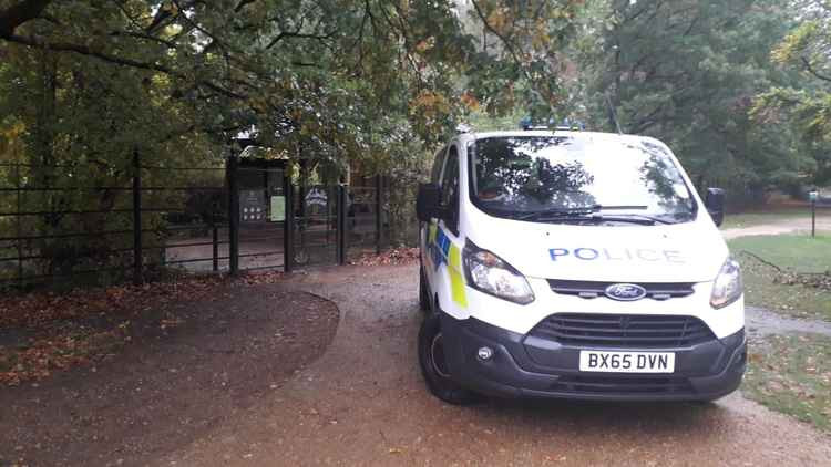 Police outside the plantation