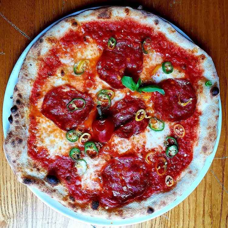 A devil's workshop pizza with salami, chilli, Pugliese tomatoes and fior di latte mozzarella