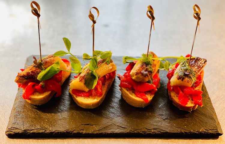 The tapas are served on small plates