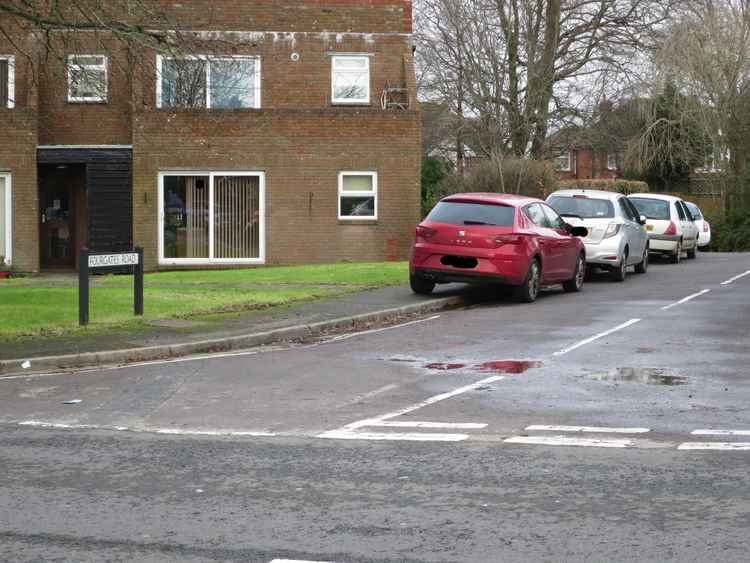 Cars park don the pavement in Fourgates Road