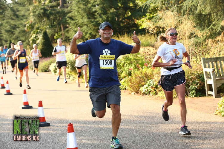 Former Chancellor Sajid Javid crosses the finish line