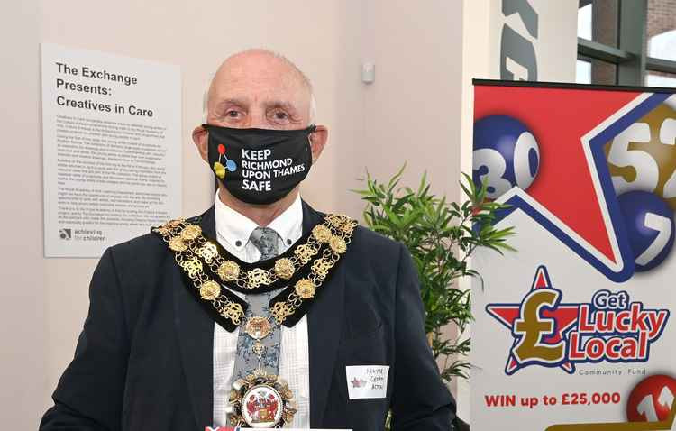 The masked Mayor of Richmond Cllr Geoff Acton at the Get Lucky Local lottery launch