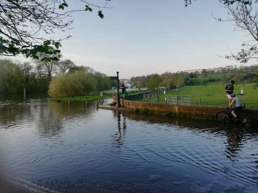 The river floods its banks in Petersham