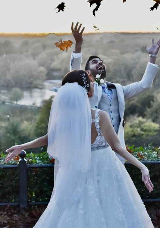 Photo by Kate Bertaut of a couple who had just tied the knot - do you recognise them?