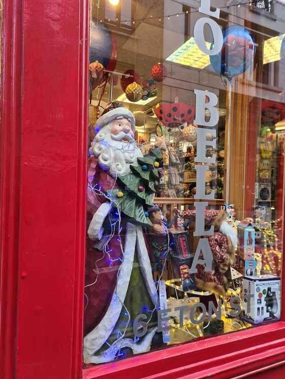 Santa in the shop window of Toy Station in Eton Street