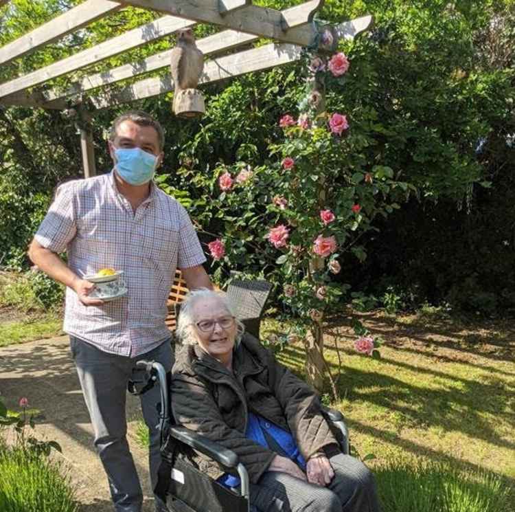 Stefan Chioariu with Cecil Court resident Pearl. Credit: C&C care homes