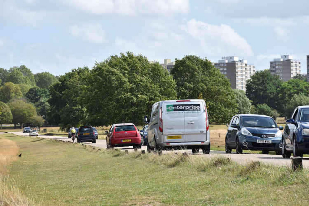 Rental van driving through the park (stock pic by Jack Fifield)