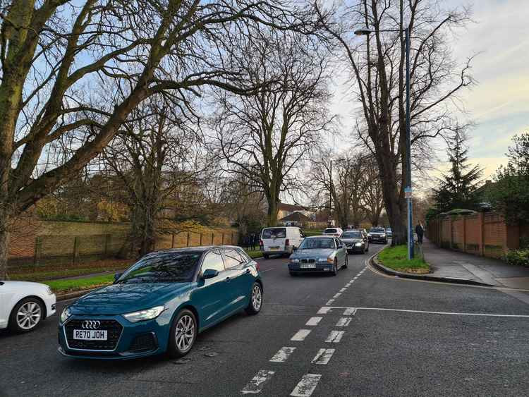 Traffic heading down Queen's Road