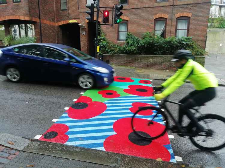 The poppy crossing outside The Poppy Factory