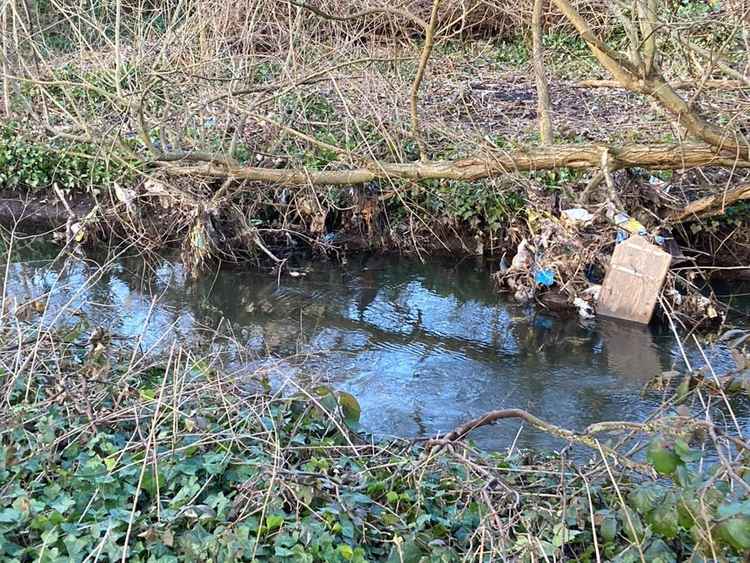 Plastic waste and pollution left behind after Mogen flood  - credit Simon Ridley