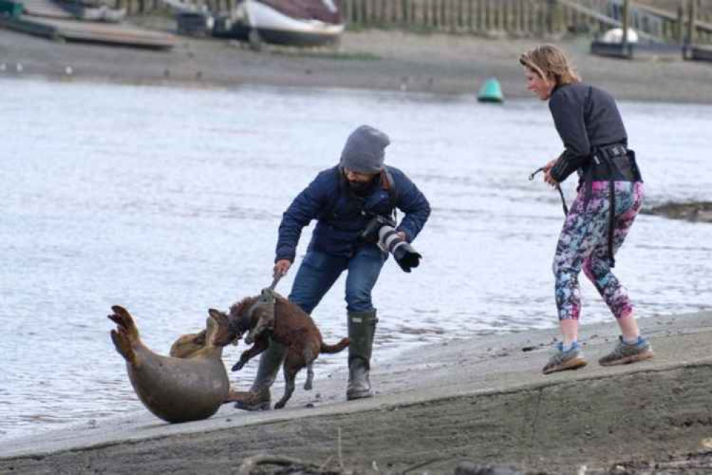 Ms Sabben-Clare, right, and her dog biting the seal near Hammersmith Bridge (picture: Duncan Phillips)