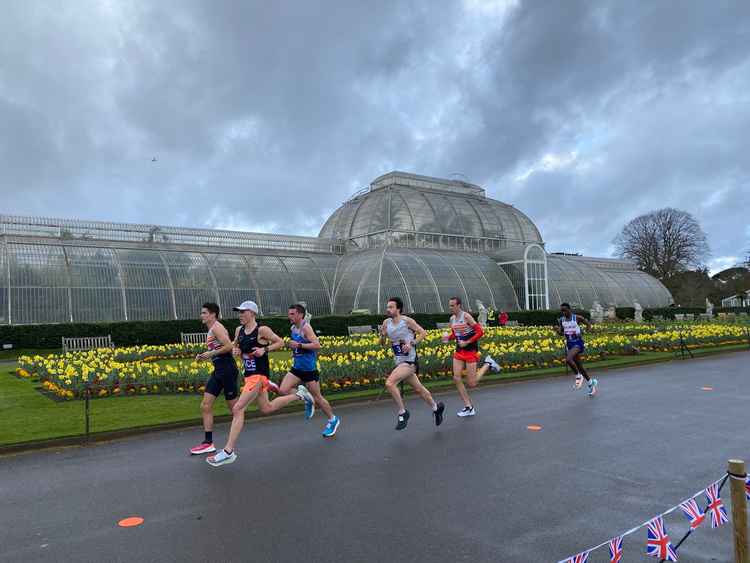 Runners heading past Temperate House