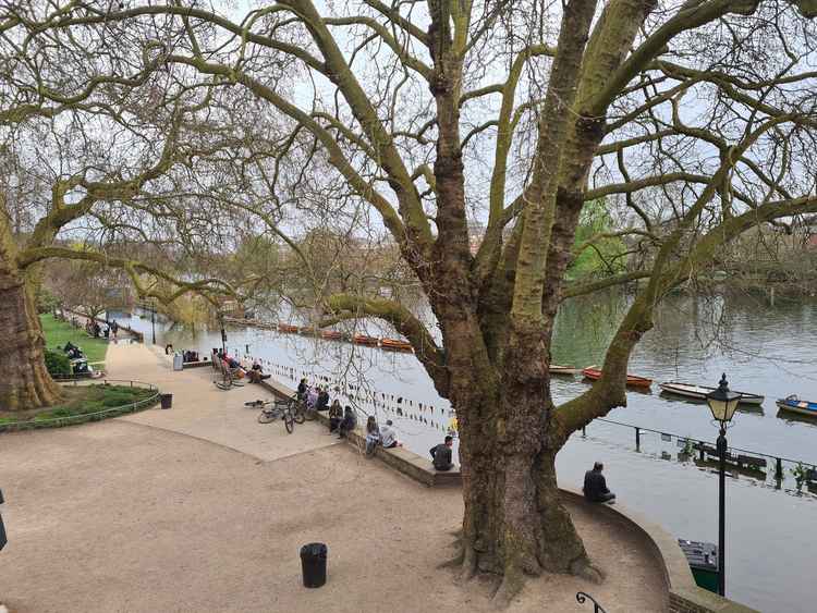 Water floods the path by Buccleuch Passage on Richmond Riverside