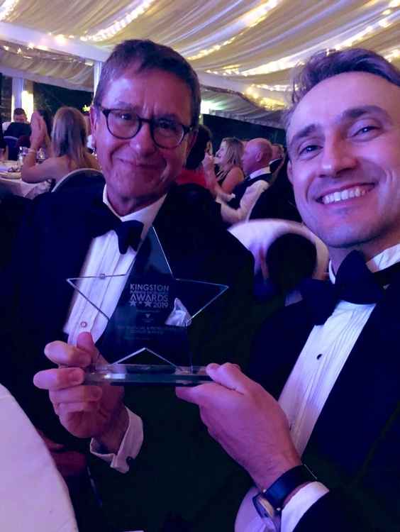 Amyr and Managing Partner Chris Hirsch with the company's award at the Kingston Business Awards (Image: Holland Hahn & Wills)