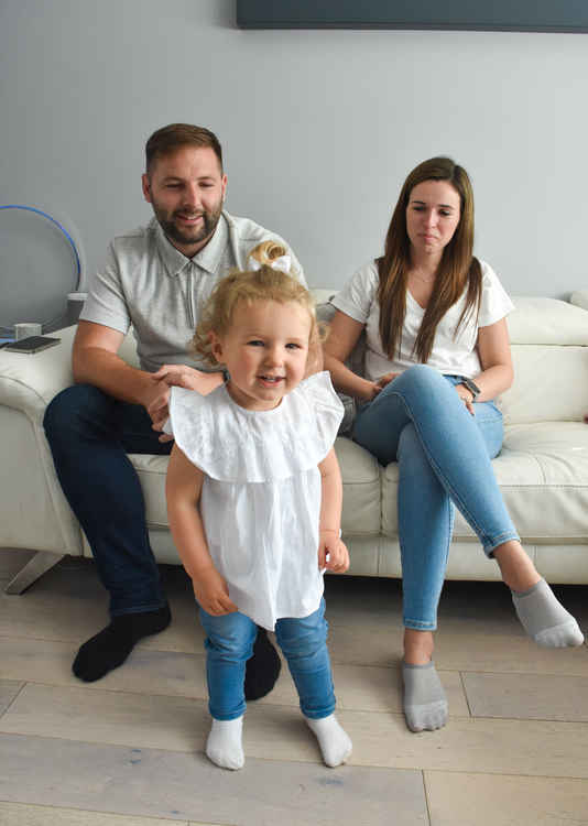 The look of love: Greg, Sasha and daughter Savannah