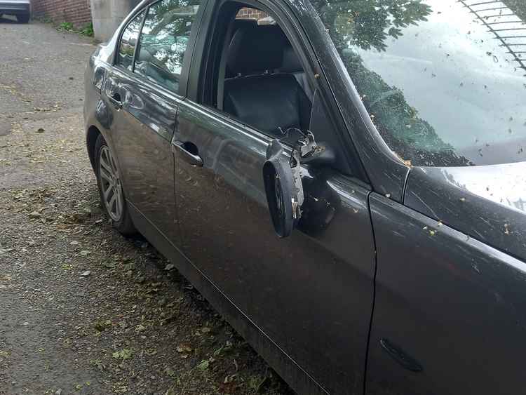 The car's wing mirror has been ripped off