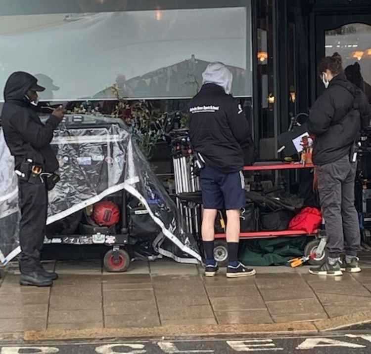 Film crew were seen outside Teddington restaurant One One Four earlier in the week (Credit: Stuart Higgins)