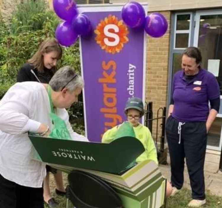 Leo, 12, receiving his goodie box (Image: Skylarks)