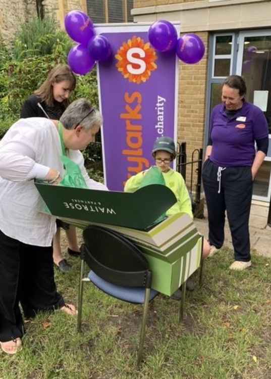 Leo, 12, receiving his goodie box (Image: Skylarks)