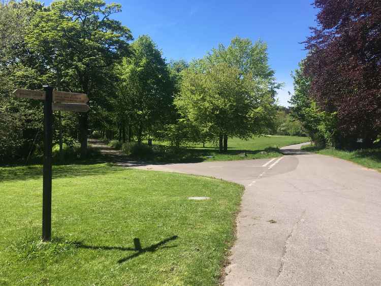 Walk straight, past junctions on your right and left, following the sign to 'Kingston Maurward House'