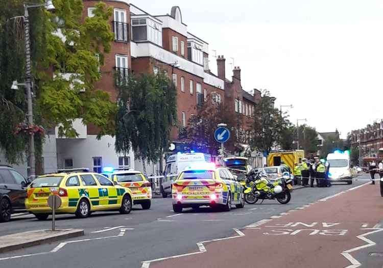 Emergency vehicles at the scene on Heath Road