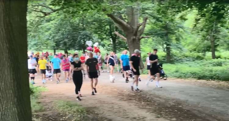 The celebratory balloons bobbed above the runners as they went. Credit: Rory Poulter.