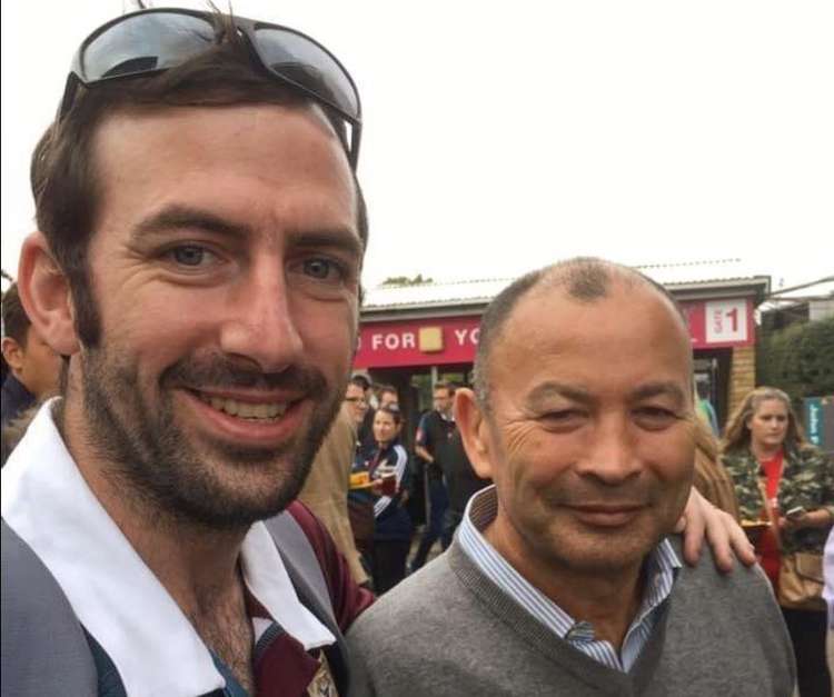 Elliot Hennell with England rugby coach, Eddie Jones. Credit: Battersea Ironsides.
