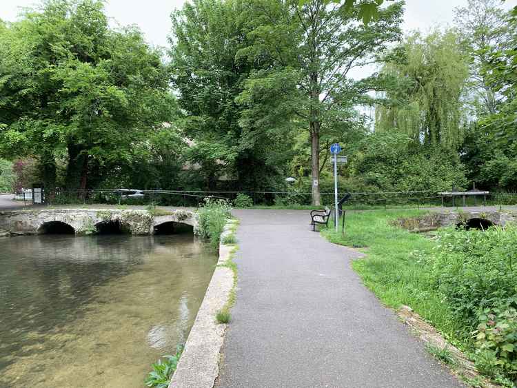 Turn right when you come to a bridge on your left and John's Pond on the right