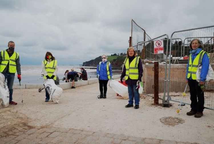 Social distancing at the beach clean