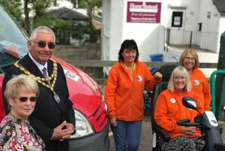 John and Linda Petherick with the chair of trustees,  Valerie Jeffries, manager Sally Preston and Sally Anne who works in the office.