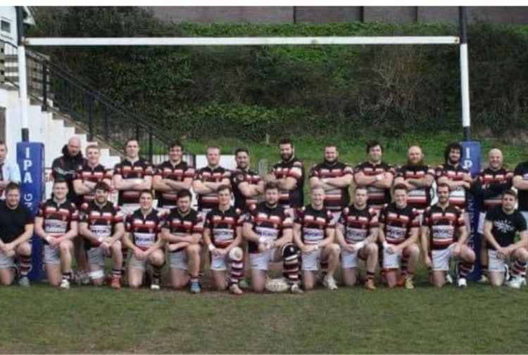 Teignmouth RFC team photo; Joe and Dan are on either side of the player with the ball, front row. Picture: Teignmouth RFC