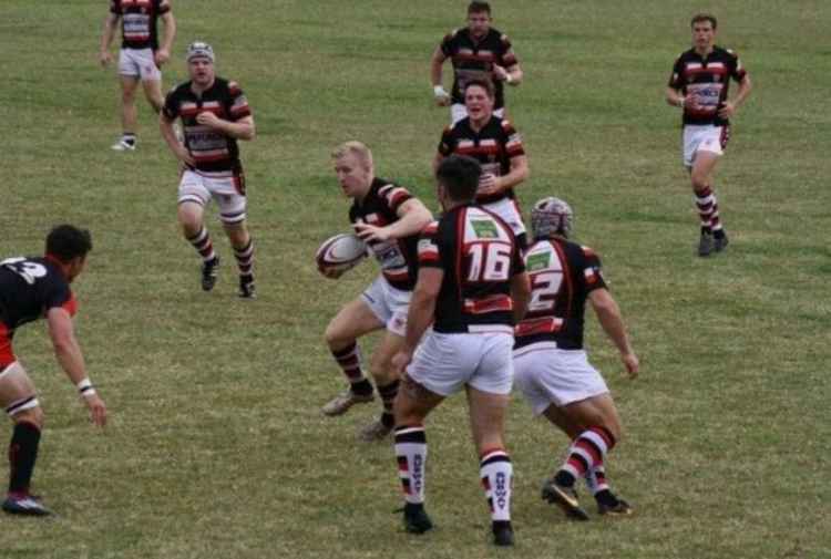 Teignmouth RFC in action; Dan has the ball, Joe is on the far right. Picture: Lorna Gray