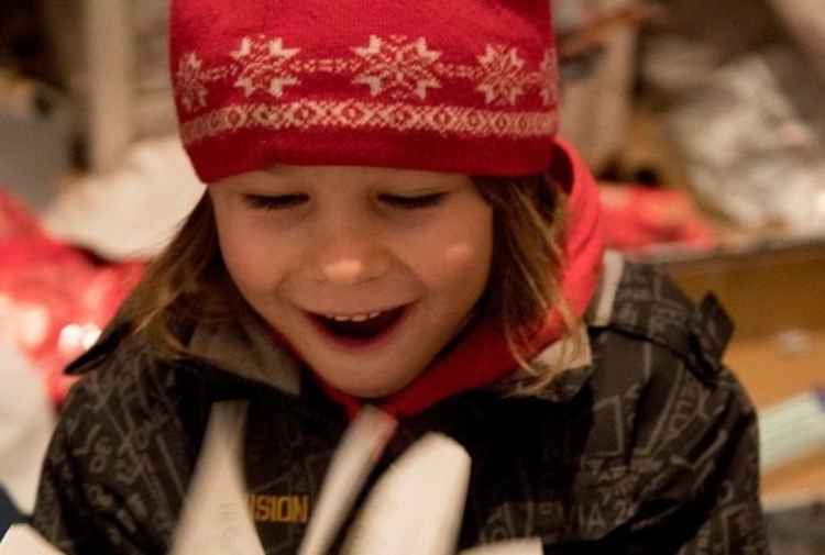 A child in Moldova receiving her Christmas gift.