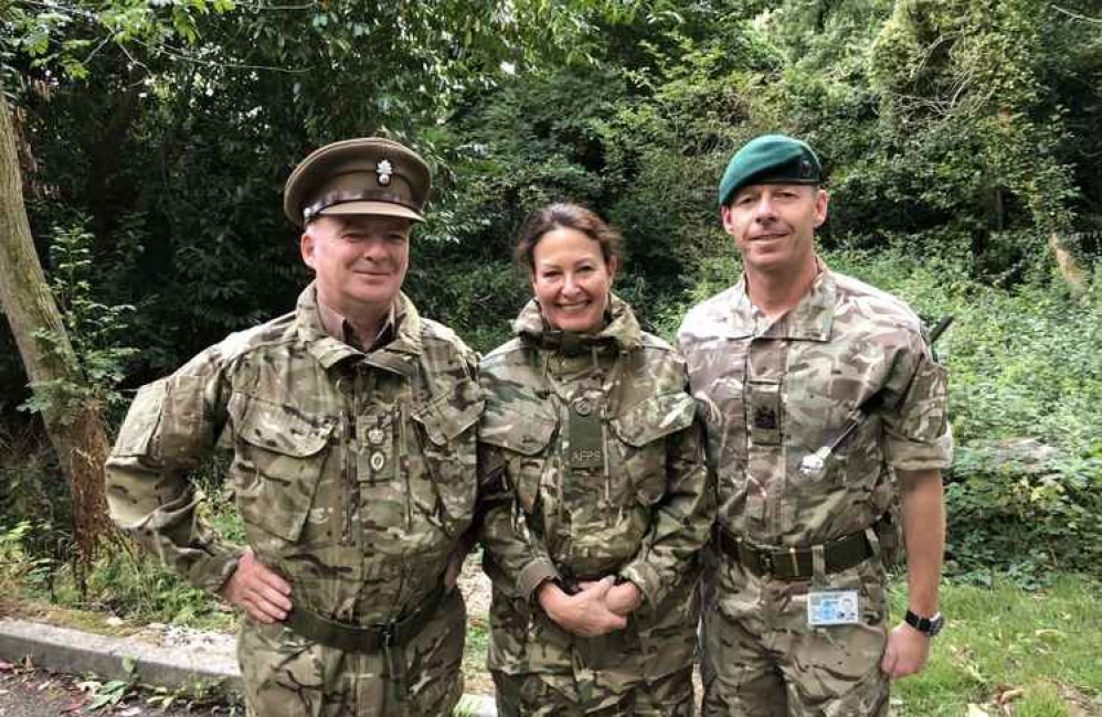 Anne Marie Morris with military personnel