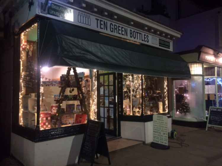 Ten Green Bottles welcomes customers in with a sign outside