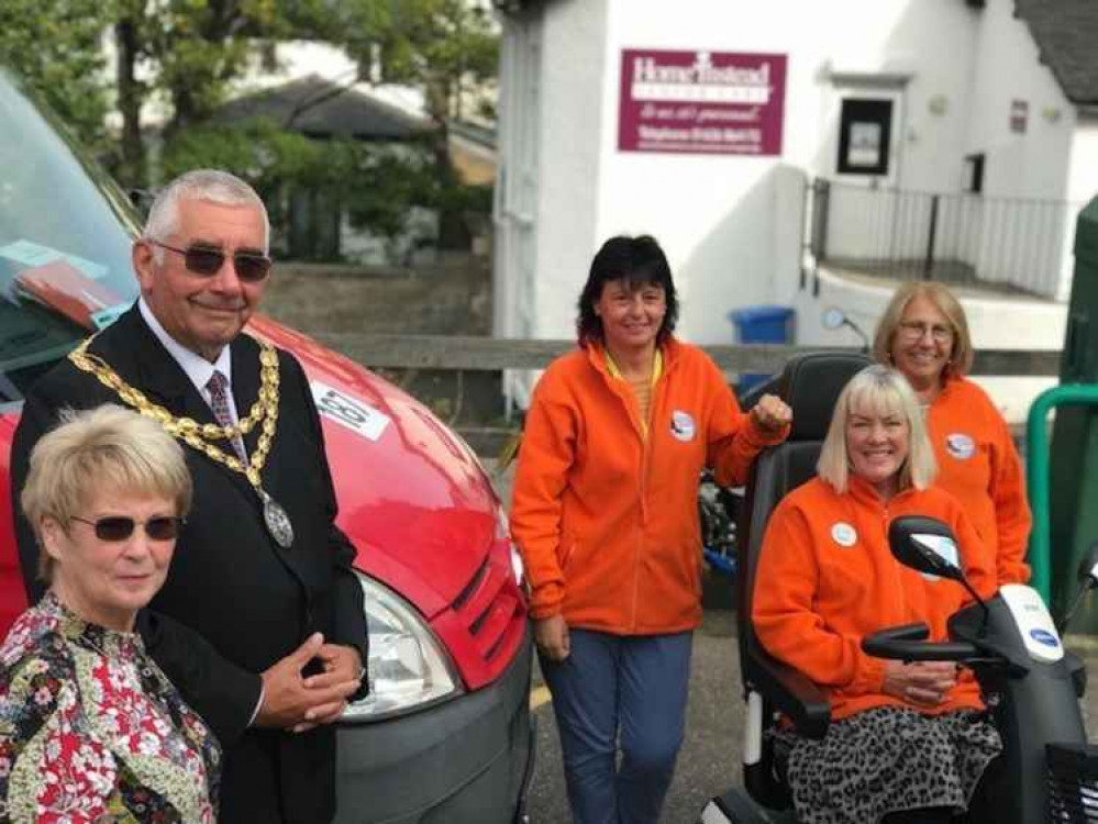 Cllrs John and Linda Petherick with the charity's chair Valerie Jeffrey, manager Sally Preston and office worker Sally Anne.