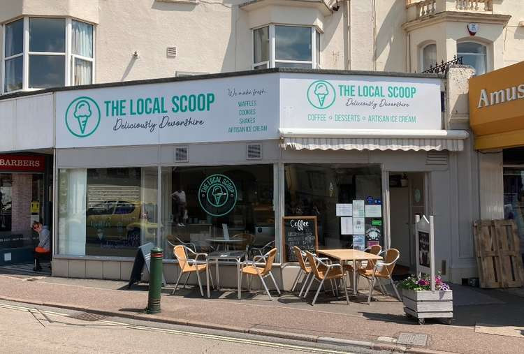 The Local Scoop can be found next to Harrisons Amusements.