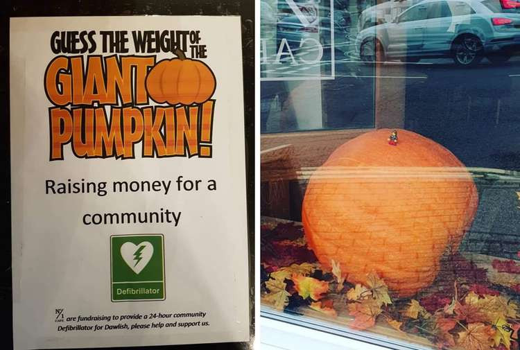 To win, you have to correctly guess the weight of a giant pumpkin in the window. Credit: No. 1 Café