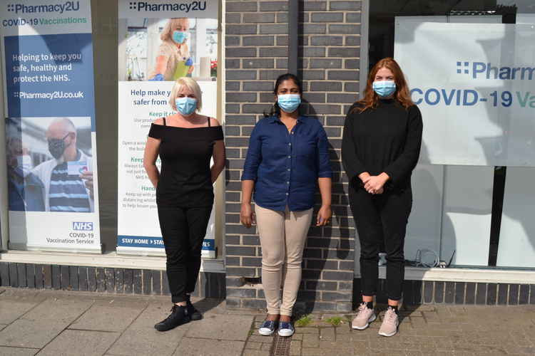 Emma Dodson, vaccinator Betty Sajan and Emma Heywood