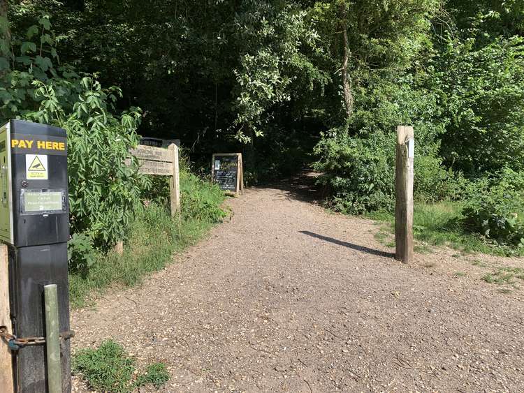 Start at the car park and go up the path by the information board