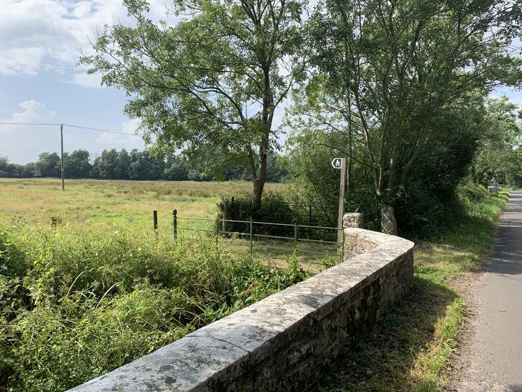 Just after the bridge, take the footpath on your left