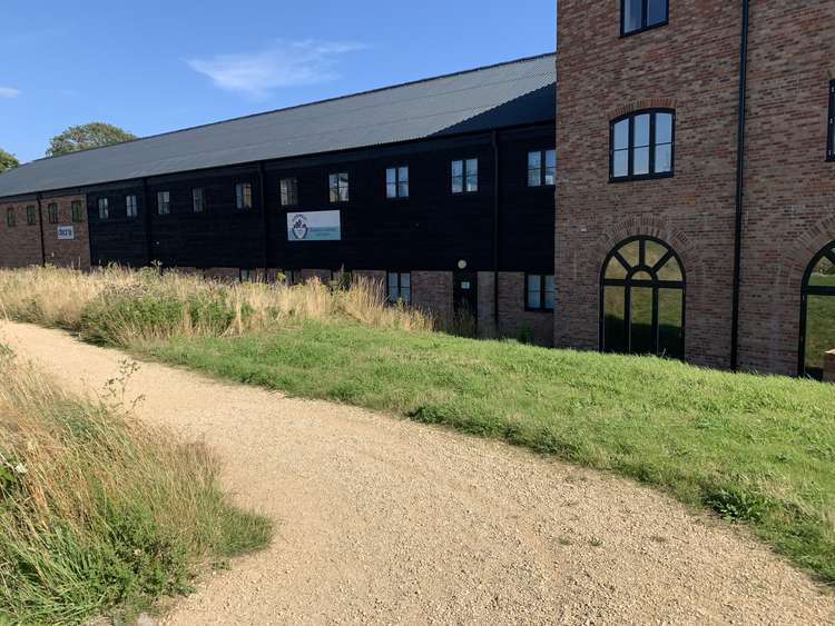 Take the gravel path past Dorwest towards the centre of Poundbury