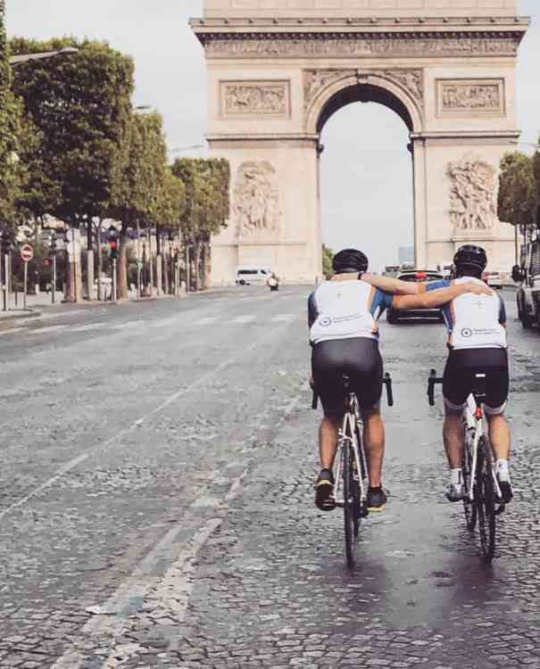 Simon and Dan Maughan approach the Arc de Triomphe