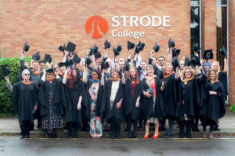 Students celebrate their graduation at Strode College