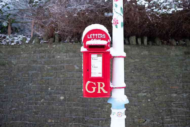 The vintage valentines lamp post box with a little snow