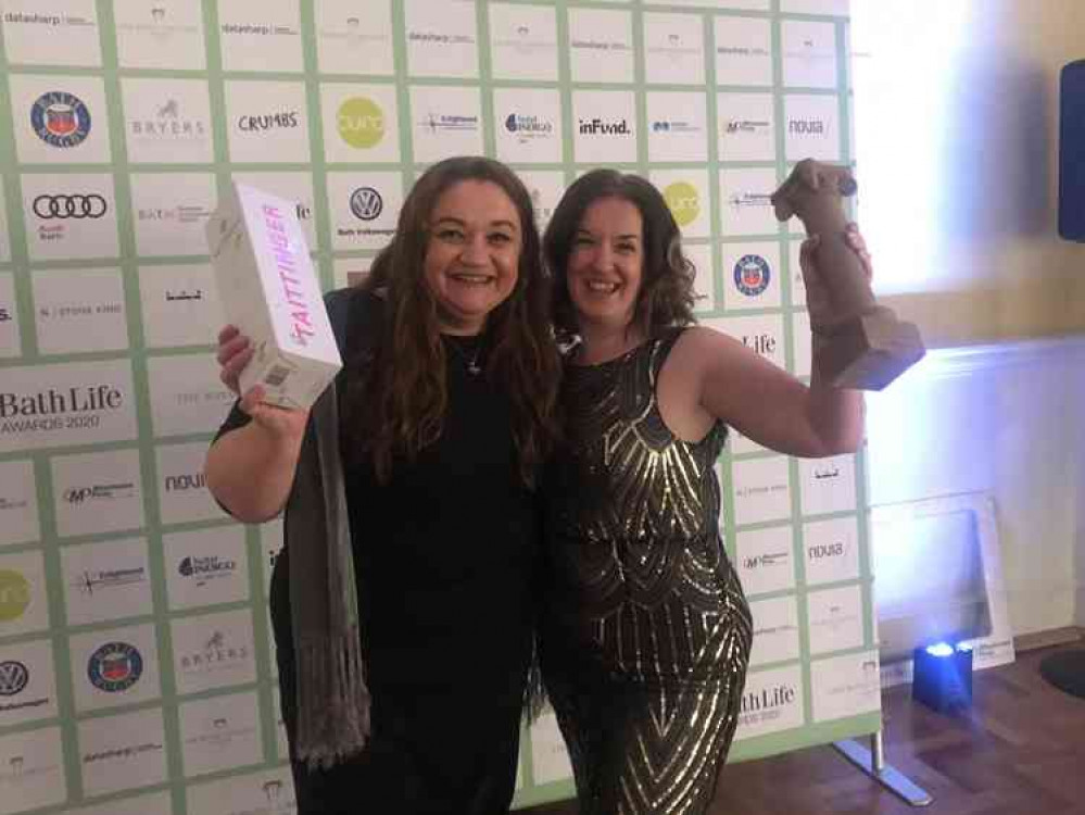 Gemma Wilkes and Helen White from WHY with the award